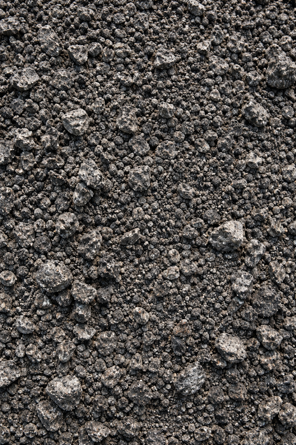 Close-up of recycled asphalt millings texture to buy asphalt millings in Dallas, TX